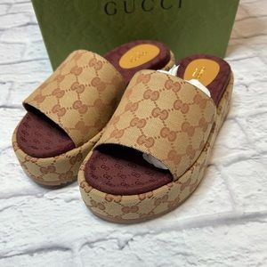 Gucci canvas platform slide sandals- purchased from Poshmark. Worn once